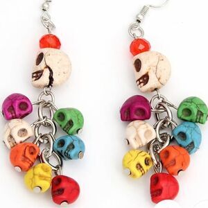 NWT Real turquoise stone skeleton earrings super cute.